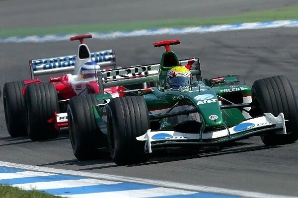 Formula One World Championship: Eleventh placed Mark Webber Jaguar R4 leads Olivier Panis Toyota TF103, who finished fifth