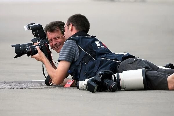 Formula One World Championship: Giero Breloer and Crispin Thruston Photographers