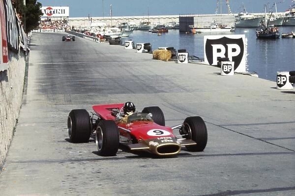 Formula One World Championship: Graham Hill, Lotus Ford 49B, started from pole and won the race