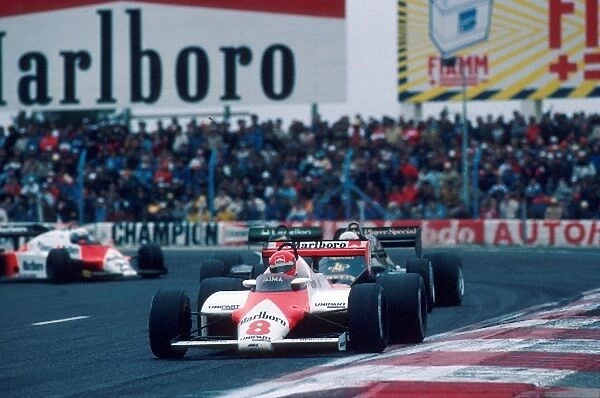 Formula One World Championship: The McLaren of Niki Lauda leads the Lotus of Elio de Angelis, the Tyrrell of Michele Alboreto and the Alfa Romeo