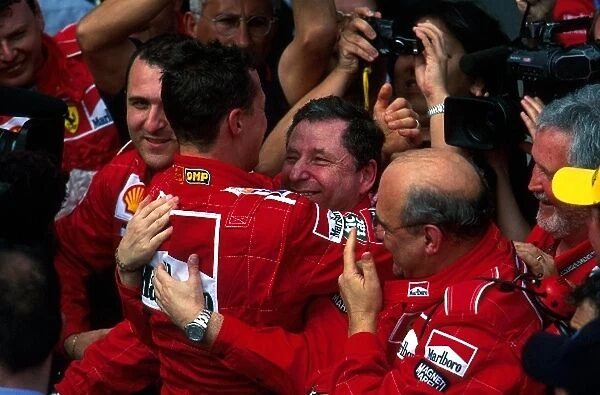 Formula One World Championship: Michael Schumacher Ferrari F1-2001 hughs Jean Todt