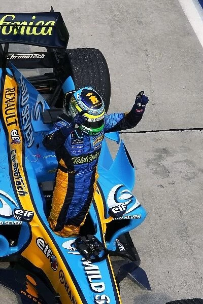 Formula One World Championship: Race winner Giancarlo Fisichella Renault R26 in Parc Ferme