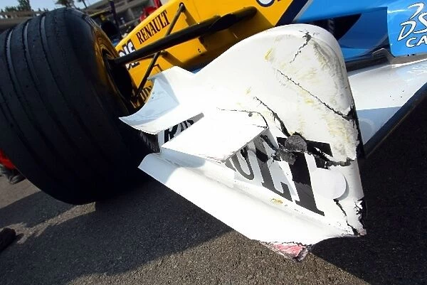 Formula One World Championship: The Renault R23 of Jarno Trulli after he hit the barriers