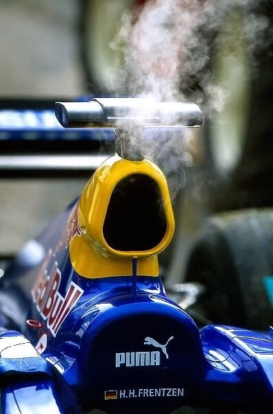 Formula One World Championship: The Sauber Petronas C22 of Heinz-Harald Frentzen smokes away gently after suffering an engine failure during