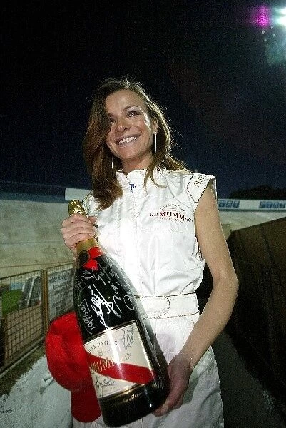 Formula One World Championship: A signed Champagne Mumm Jeroboam which has been signed by the drivers and Brazilians who played in the football match