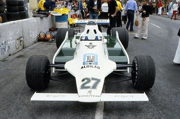 Formula One World Championship: The Williams Ford FW07 of Alan Jones stands in the pitlane during practice, he finished the race in 3rd place