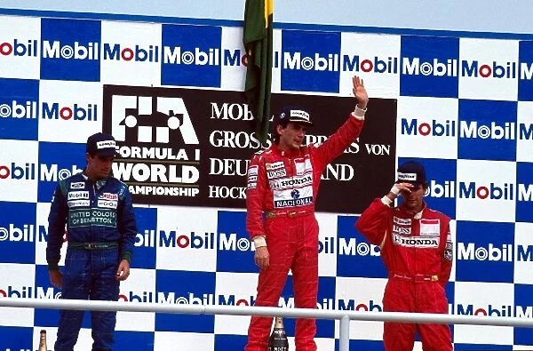 Formula One World Championship: Winner Ayrton Senna, with second place Alessandro Nannini, left, and third place Gerhard Berger