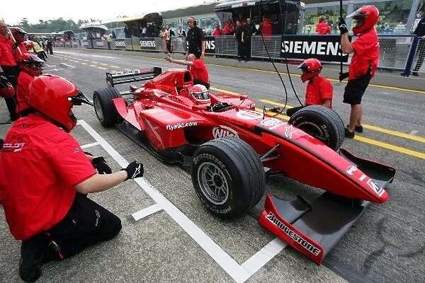 GP2: Mathias Lauda Coloni makes a pit stop