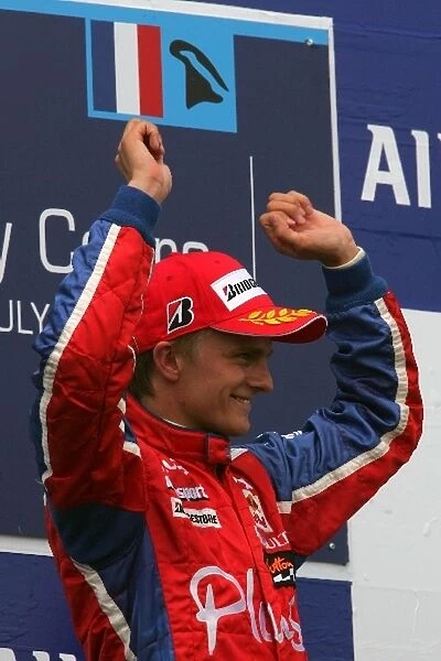 Grand Prix 2: Race winner Heikki Kovalainen Arden International on the podium