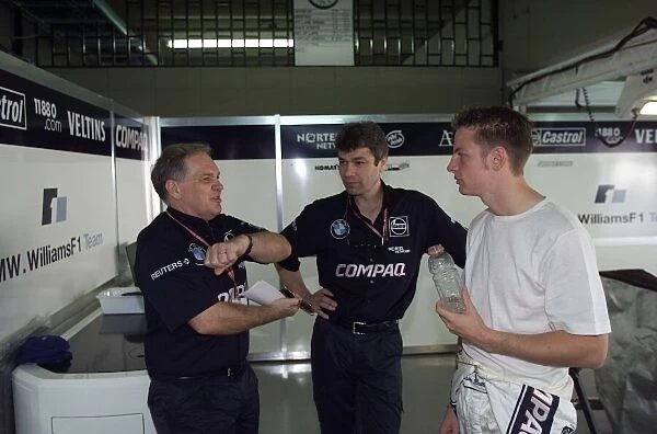 Jenson Button talks with Patrick Head