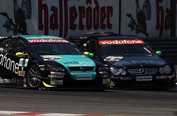 Marcel Faessler (SUI), AMG Mercedes-Benz CLK-DTM, overtakes Manuel Reuter (GER)