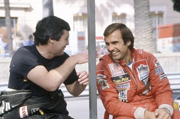 Monte Carlo, Monaco. 29-31 May 1981: Alan Jones and Carlos Reutemann in the pits. Portrait