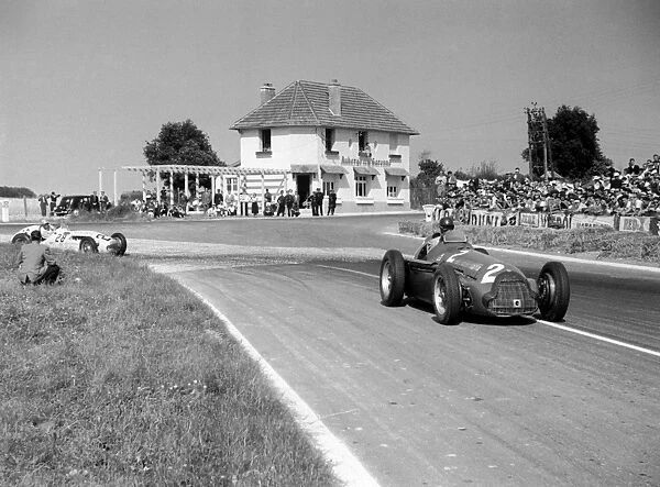 Reims, France. 1 July 1951: Giuseppe Farina, 5th position, leads Johnny Claes