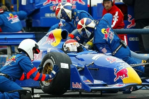 Seventh placed Eddie Cheever (USA) Red Bull Racing Dallara Infiniti makes a pit stop