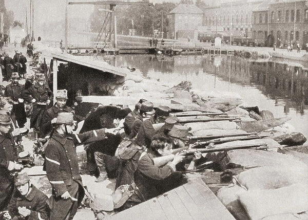 Belgian soldiers defending the sandbagged Willebrock Canal from the advancing Germans during WWI. From The Pageant of the Century, published 1934