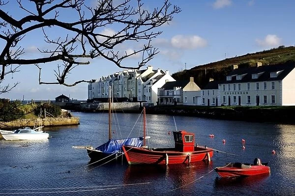 Boats Moored At A Riverbank With Buildings In The Background, Cushendun, County Antrim, Northern Ireland