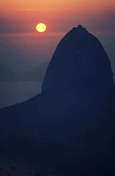 Brazil, Rio De Janeiro, Sugarloaf Mountain Silhouetted At Sunset