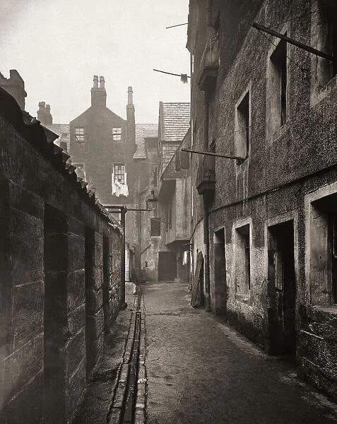 Close, 115 High Street, Glasgow, Scotland in the 1870 s. Photograph from The Old Closes and Streets of Glasgow, by Scottish photographer Thomas Annan 1829-1887