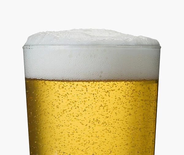 Close-Up Detail Of Beer In Wet Glass
