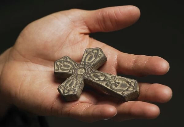 Cross In Palm Of Hand