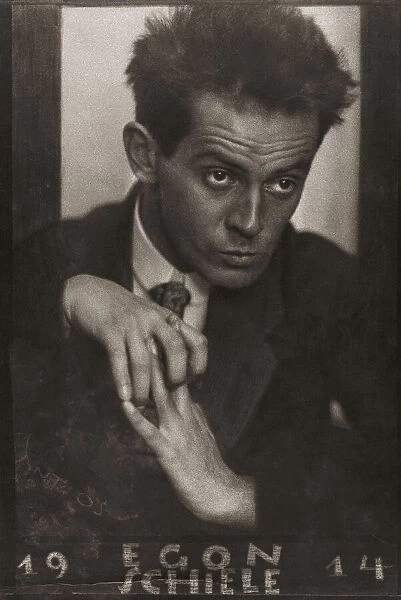 Egon Schiele, 1890 - 1918, an Austrian painter. After a 1914 portrait by Austrian born Czech photographer Anton Josef Trcka. Trcka signed his work Antios. In this photograph the pseudonym is crudely scratched on the lower left of the picture; Austria