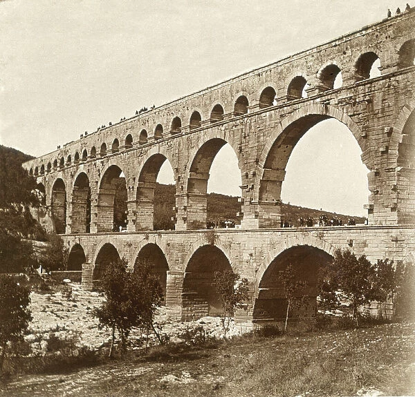 French stereoscopic editions, positives on glass from circa 1920 for viewing thought a stereoscope. Pont du Gard. The Pont du Gard is an ancient Roman aqueduct that crosses the Gardon River near the town of Vers-Pont-du-Gard in southern France