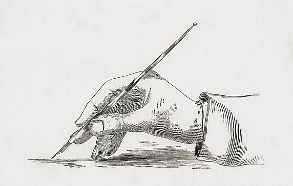 Hand holding old fashioned pen with nib. After a 19th century print by an unidentified artist