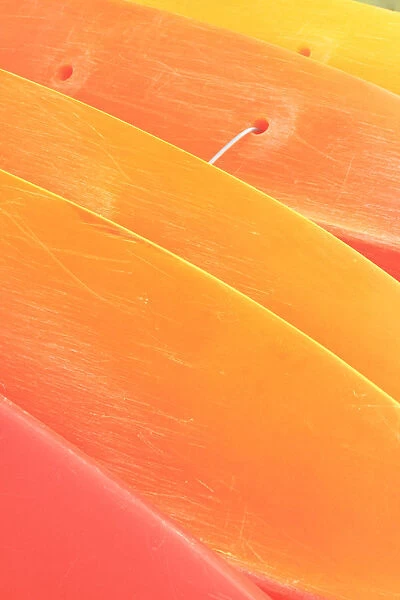 Hawaii, Oahu, Pattern Shot Of Orange Yellow Kayaks Stacked On Each Other