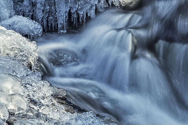 Icicles And Blue Shadowed Cascades On A Small Waterfall; Enfield, Nova Scotia, Canada