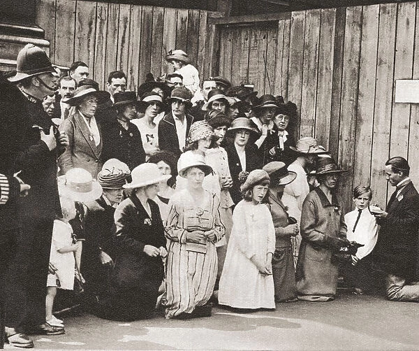 Irish men, women and children on their knees praying in Downing Street during the Anglo-Irish Treaty meetings of 1921. The Anglo-Irish Treaty, also known as The Treaty, was an agreement between the government of the United Kingdom of Great Britain and Ireland and representatives of the Irish Republic that ended the Irish War of Independence and provided for the establishment of the Irish Free State. From These Tremendous Years, published 1938