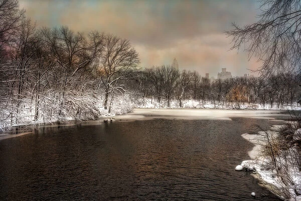The Lake partially frozen in winter in Central Park, New York City, New York, USA