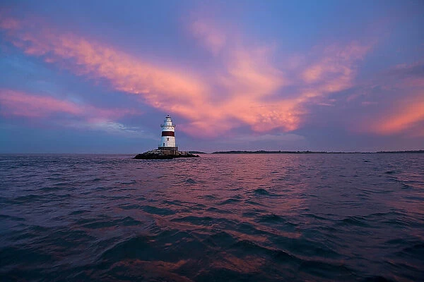 NA. Latimer Reef Lighthouse at sunset