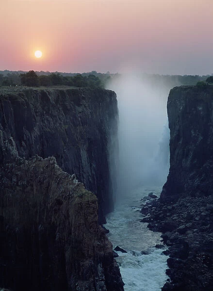 Looking Along Victoria Falls At Dusk From Zambia To Zimbabwe