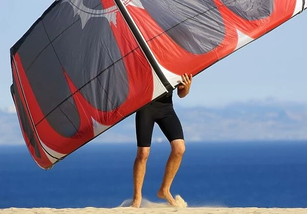 Man Holding Kite For Surfing; Costa De La Luz, Andalusia, Spain