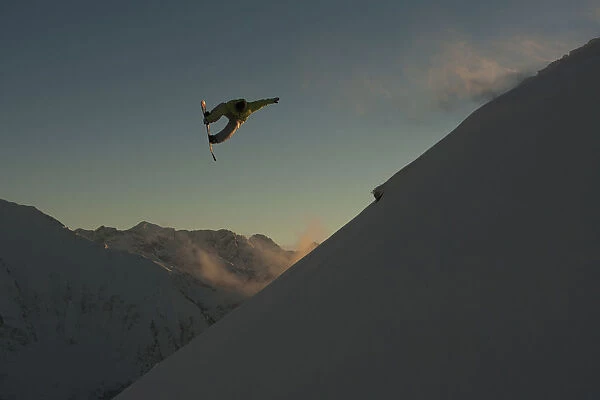 Professional Snowboarder, Frederik Kalbermatten, Extreme Snowboarding At Sunset, Arlberg, Austria