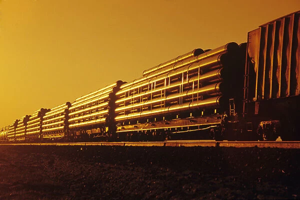 Rail Car Train Carrying Steel Pipe, Near Winnipeg, Manitoba