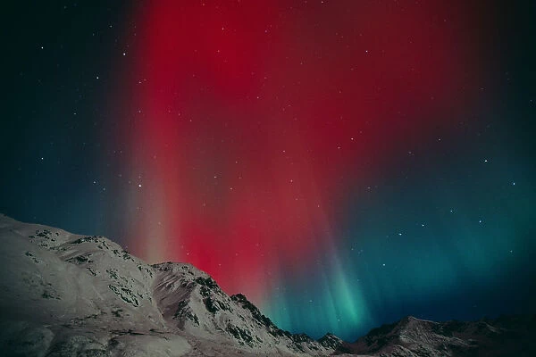 Red Aurora Over Talkeetna Mountains At Hatcher Pass In Southcentral, Alaska