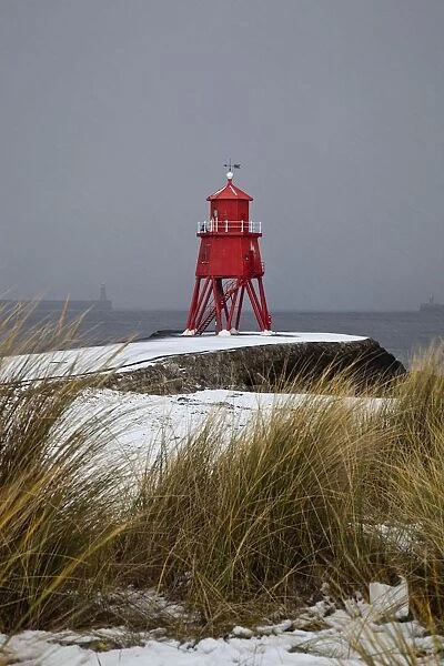 A Red Lighthouse Along The Coast; South Shields, Tyne And Wear, England
