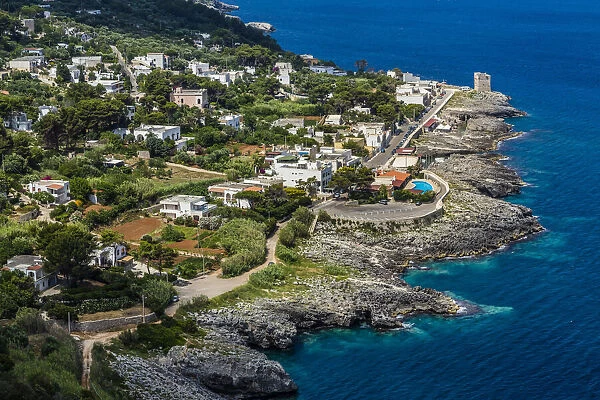 Scenic overview of the coast and the medieval and modern town of Castro in Puglia, Italy