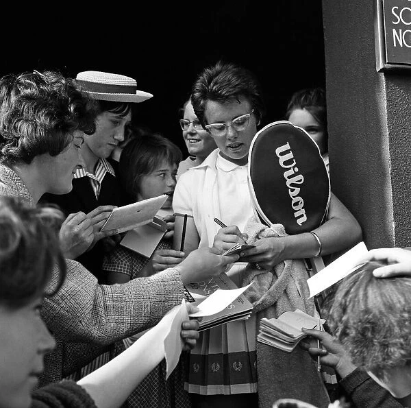 The 1962 Championships, Wimbledon. Billie Jean Moffitt (later King) signs autographs