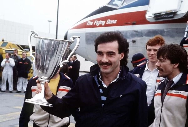 Aberdeen team captain Willie Miller with the European Cup Winners Cup trophy after their