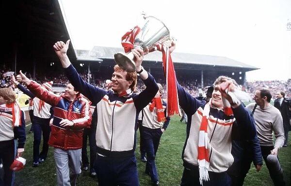 The Aberdeen team show off the European Cup Winners Cup trophy to fans at Pittodrie