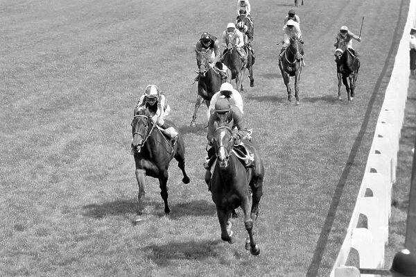 Action from the Oaks at Epsom, which was won by jockey Willie Carson