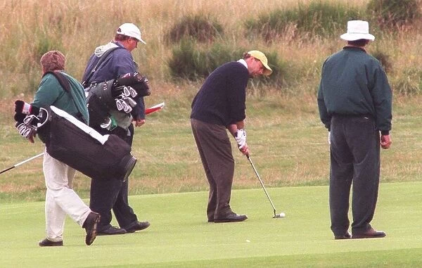 Actor Bruce Willis playing golf at Prestwick August 1998