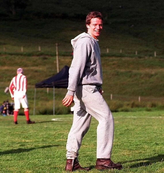 Actor Max Beesley August 1998 in grey tracksuit during filming of The Match at Glen