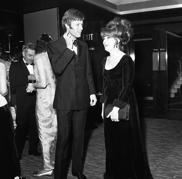 Actor Richard Chamberlain and actress Veronica Strong at the Royal Garden Hotel for