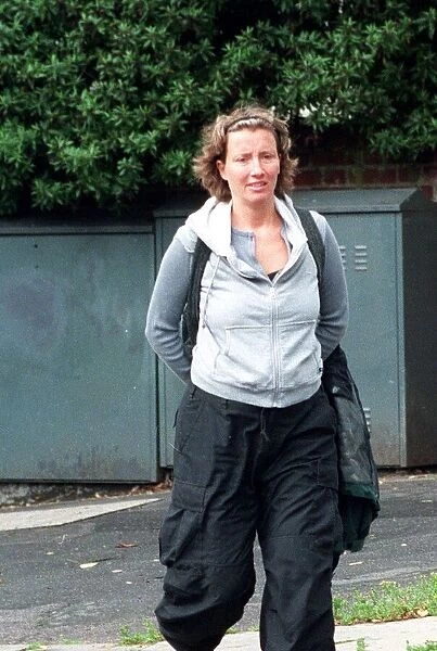 Actress Emma Thompson who is pregnant and out and about. dtgu