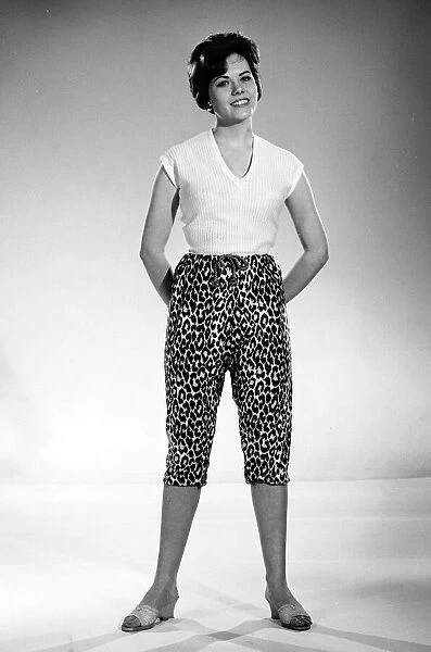 Actress and model Wendy Richard seen here modelling a pair of leopard print jeans