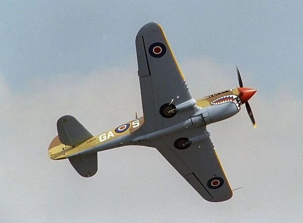 Aircraft Curtis Kittyhawk flying at the Wroughton Airshow August 1993