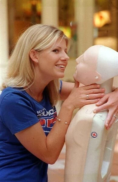 Alison Douglas TV Presenter - August 1999 Gives mouth to mouth resuscitation to a